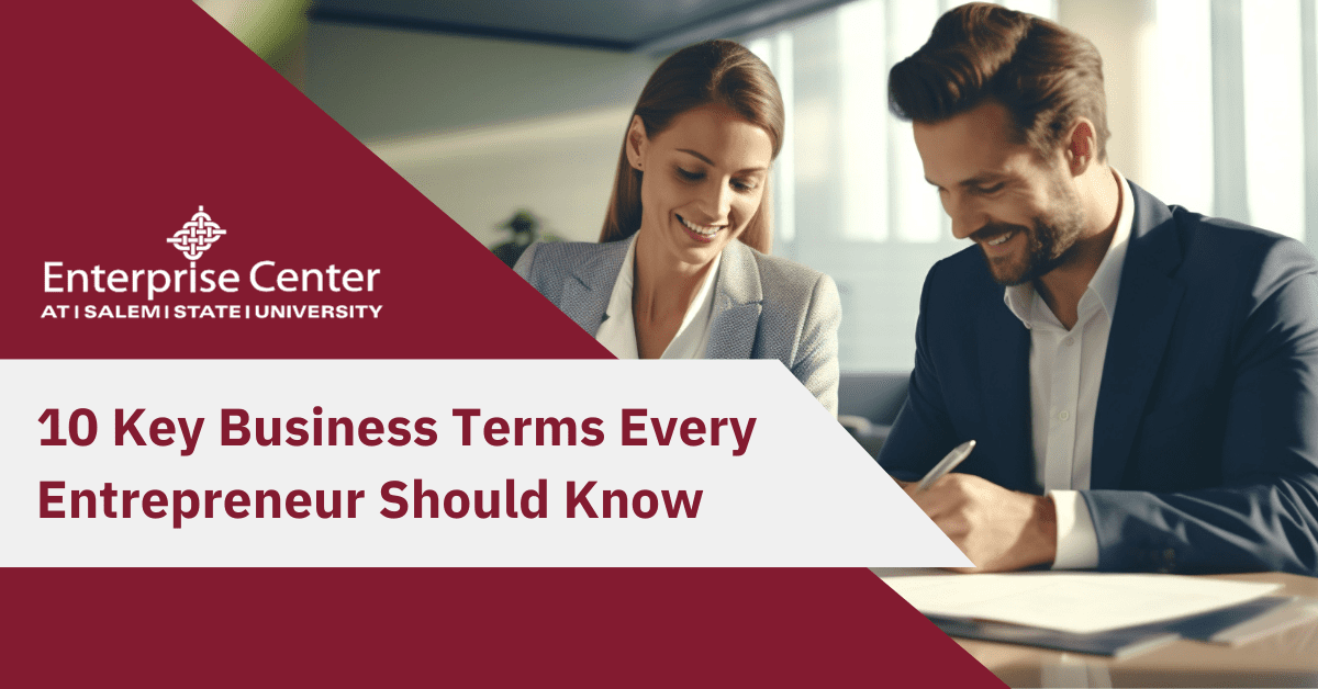 enterprise blog graphic, key business terms, man and woman at desk working