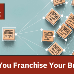 white + red blog title graphic "Should You Franchise Your Business?"